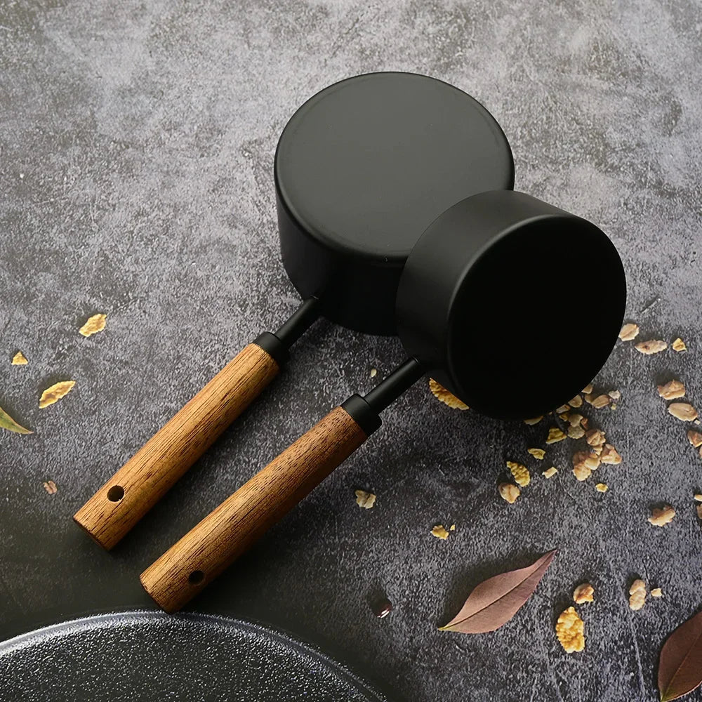 Set de medidores de acero inoxidable con mangos de madera