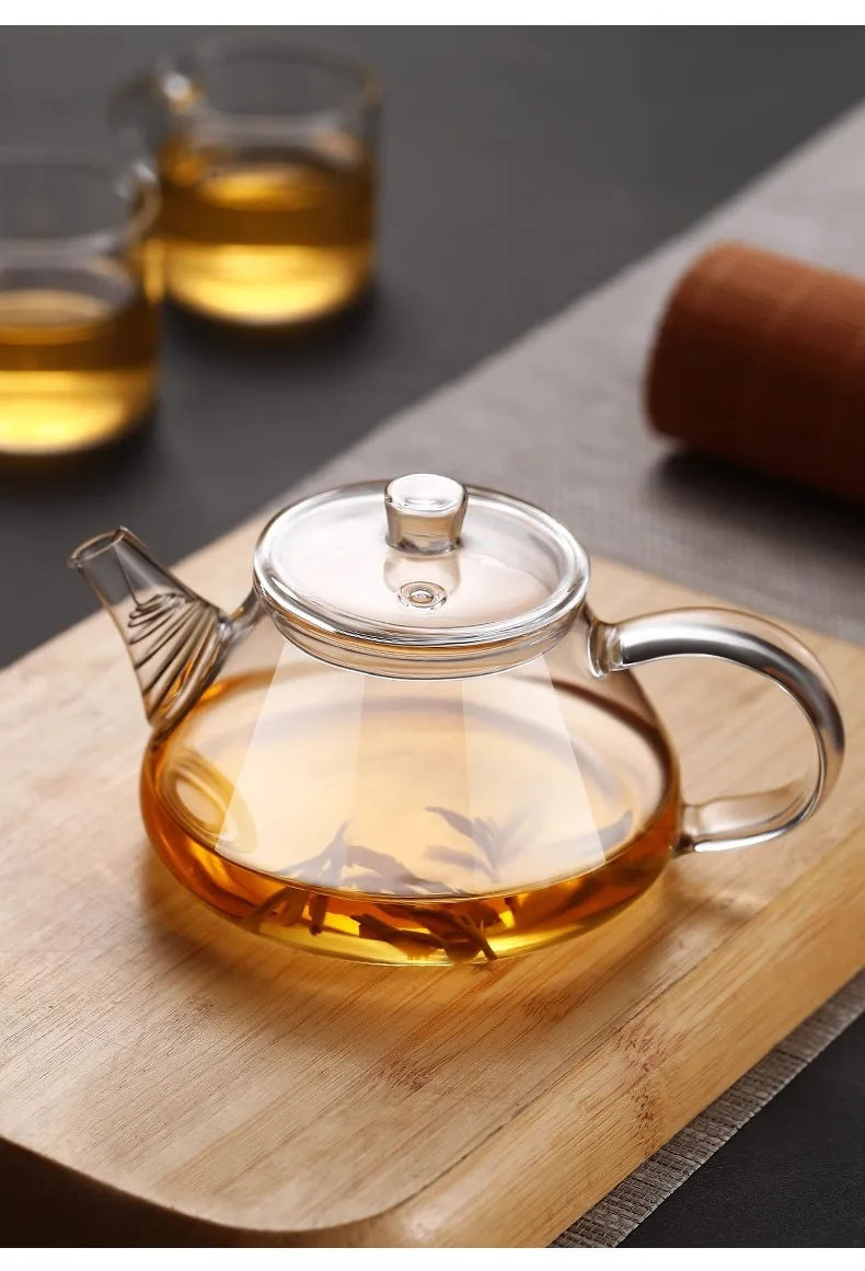 Mini tetera de vidrio resistente al calor con filtro para té