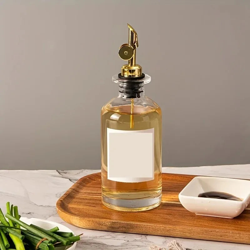 Aceitera de vidrio transparente para aceite y vinagre