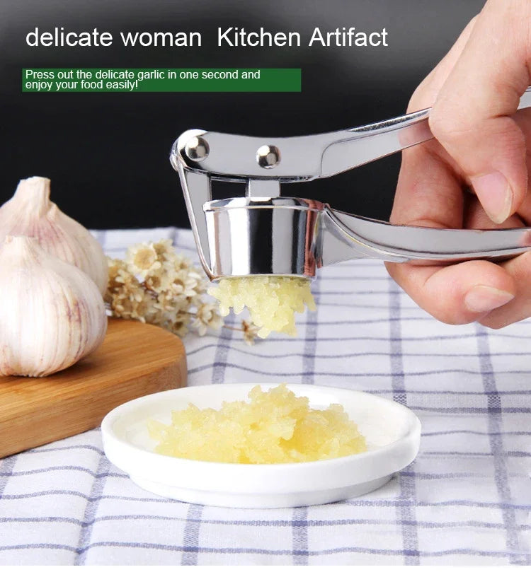 Prensa manual de ajo y jengibre plateada