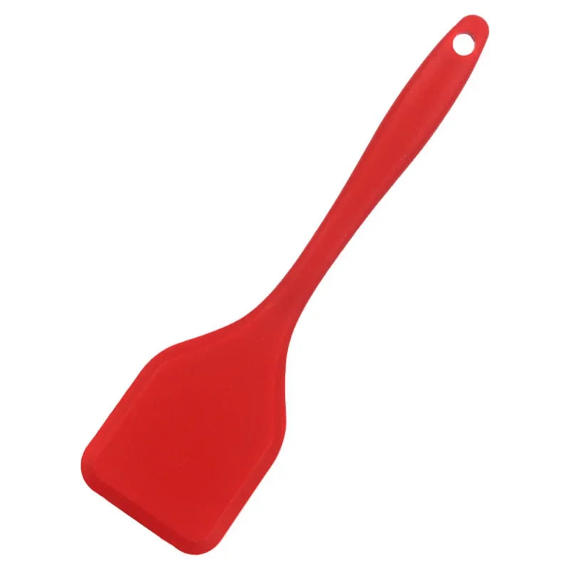 Espátula ranurada de silicona para pescado y omelettes