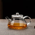 Mini tetera de vidrio resistente al calor con filtro para té